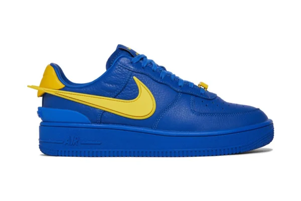 Discover the striking AMBUSH x Air Force 1 Low 'Game Royal' rep shoes, featuring a vibrant royal blue colorway with AMBUSH's distinctive stylistic flair.