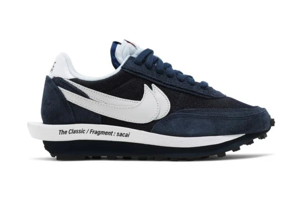 Combining features of the LDV and Waffle Racer, the rep shoe's hybrid construction emerges in mesh and suede, finished in navy and contrasted by white...