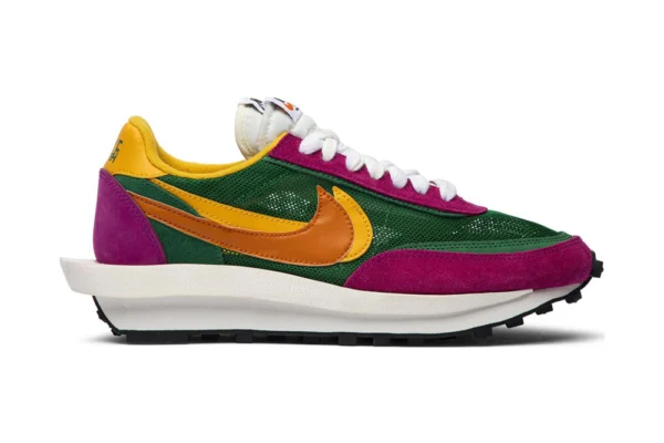 Sacai x LDWaffle 'Pine Green' rep sneakers showcase Sacai's signature layered aesthetic, featuring a bold pine green and orange colorway that stands out.