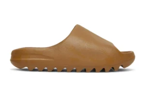 Yeezy Slides Replica 'Ochre' - Embrace a touch of warmth and style with these slides in a rich 'Ochre' hue. Elevate your casual look with their unique color.