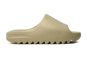 The Replica Yeezy Slide "Sand" comes in a soft, neutral "Sand" colorway that complements its minimalist design. Shop now for fast shipping!